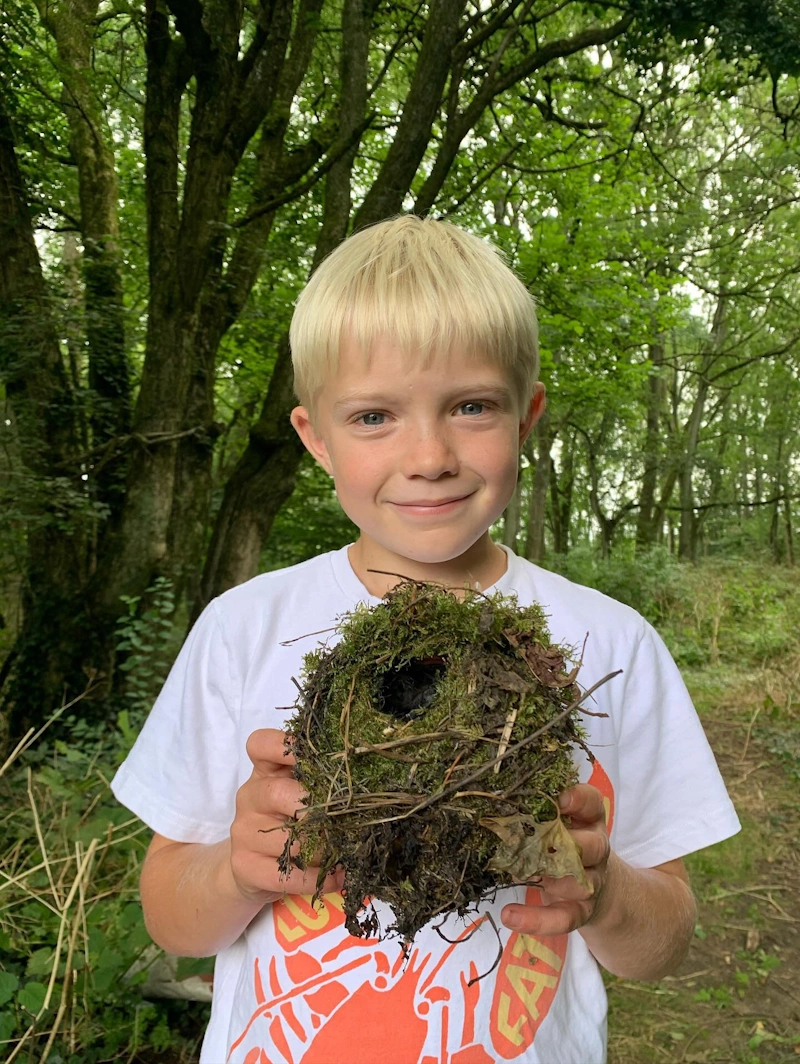 Young person with nest